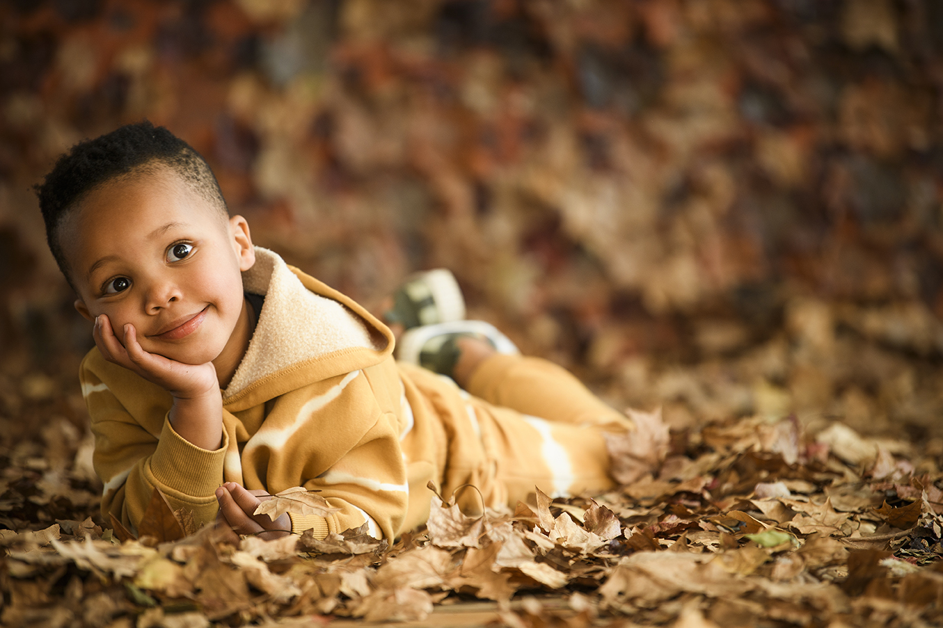 Child/ kids portrait on outdoor autumn inspired backdrop, shot in Johannesburg studio by Kevin Mark Pass Photography